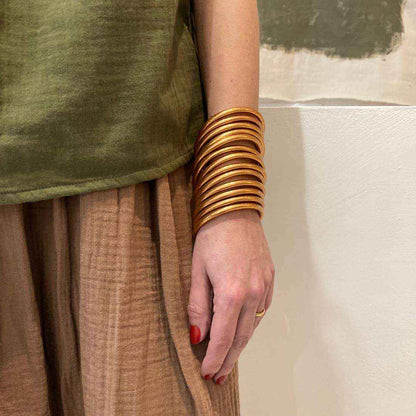 Gouden boeddhistische armband van koperpoeder, licht en symbolisch, voor sieraden en accessoires